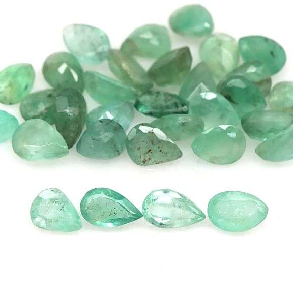 Bright emerald green 7.15ct 31pc Emerald set