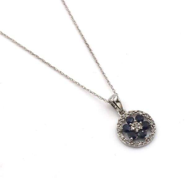 10kt White gold sapphire and diamond halo flower pendant on chain