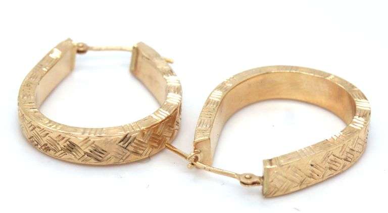 14kt Yellow gold diamond cut oval hoops