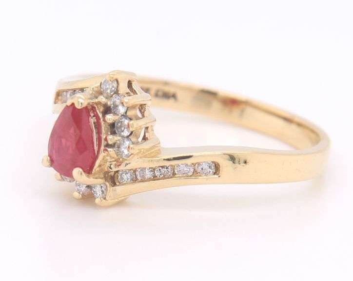 14kt Yellow Gold Pear Shaped Ruby and Diamond Bypass Ring