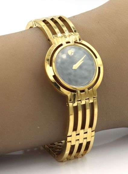 Movado Esperanza gold tone quartz black dial watch