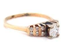14kt Yellow gold round brilliant cut diamond ring