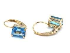 14kt Yellow gold emerald cut blue topaz lever back earrings