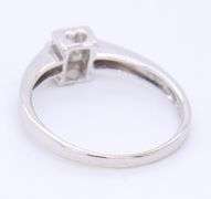 18kt White Gold approximate 0.25ctw Princess Cut Invisible Set Ring