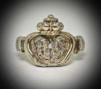 Ornate 14K White Gold Claddaugh Ring with Diamonds