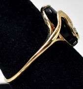 Elegant 10K Yellow Gold Black Onyx and Diamond Ring