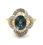 Elegant 14K YG Deep Blue Topaz and Diamond Ring