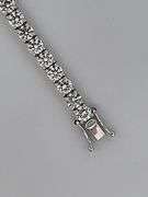 CERTIFIED BRAND NEW 14K WHITE GOLD TENNIS BRACELET. 11.00 CARATS OF DIAMONDS.