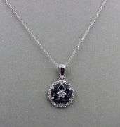 10kt White gold sapphire and diamond halo flower pendant on chain