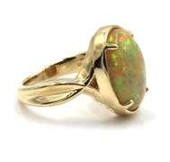 14kt Yellow gold oval opal Crisscross ring
