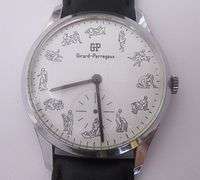 CONTENT OF SAFE DEPOSIT BOX: RARE GIRARD PERREAUX WITH KAMA SUTRA DIAL