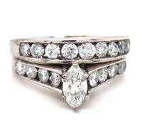 14kt White gold 0.40ct marquise and 0.75ctw channel set engagement ring