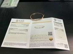 CERTIFIED 18K ROSE GOLD DIAMOND BANGLE BRACELET.