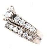 14kt White gold 0.40ct marquise and 0.75ctw channel set engagement ring