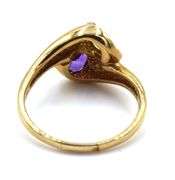 14kt Yellow gold amethyst and peridot bypass ring