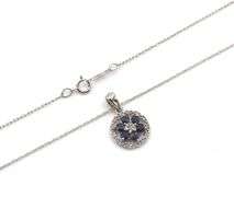 10kt White gold sapphire and diamond halo flower pendant on chain
