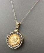 1/10oz Kruferrand coin pendant on 14kt yellow gold chain