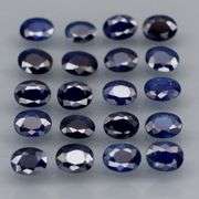 Beautifully colored 4.03ct ink blue Sapphire set