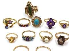 Group lot of 14kt Yellow gold gemstone rings and one pair of earrings