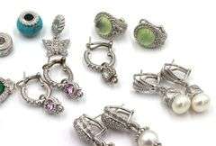 Lot of Judith Ripka 925 sterling silver earrings and charms
