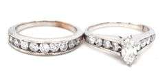 14kt White gold 0.40ct marquise and 0.75ctw channel set engagement ring