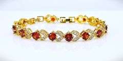 18 Kt Yellow Gold Plate Simulated Padpaparacha Sapphire Bracelet and More4 Piece Jewelry Set