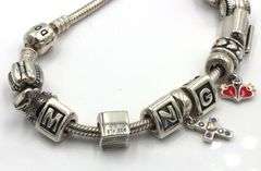 Pandora bracelet with charms in 925 sterling silver