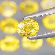 SUPERB!!! VS to eye clean 2.07ct vivid yellow Sapphire set