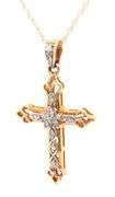 10kt Yellow gold diamond cross pendant on chain