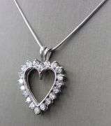 14kt White gold 1.25ctw open diamond heart pendant on chain