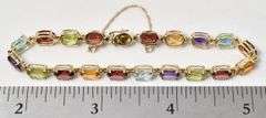 Colorful 14K Yellow Gold Red Garnet, Blue Topaz, Amethyst, Peridot, and Citrine Gemstone Bracelet