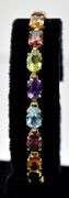 Colorful 14K Yellow Gold Red Garnet, Blue Topaz, Amethyst, Peridot, and Citrine Gemstone Bracelet
