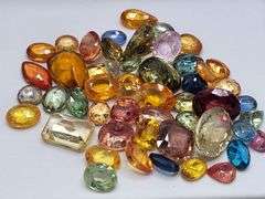 Collector's item! 23.5 Carat  very fine natural Sapphire, Ruby, Topaz, Tanzanite, Amethyst, others