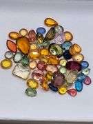 Collector's item! 23.5 Carat  very fine natural Sapphire, Ruby, Topaz, Tanzanite, Amethyst, others