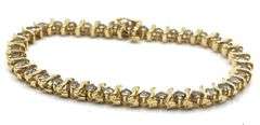 14kt Yellow gold 3.80ctw diamond S tennis bracelet