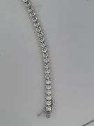CERTIFIED BRAND NEW 14K WHITE GOLD TENNIS BRACELET. 11.00 CARATS OF DIAMONDS.
