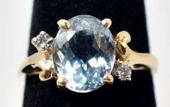 Beautiful 14K Yellow Gold Blue Topaz and Diamond Ring