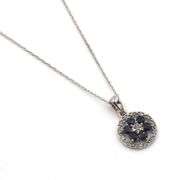 10kt White gold sapphire and diamond halo flower pendant on chain