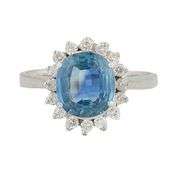 2.10ct Oval Sapphire and 0.25ctw Diamond Frame Ring in 18K