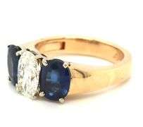 14kt Yellow gold 1.22ct oval diamond and 3.50ctw oval sapphire 3 stone super fit ring