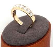 14kt Yellow gold 0.90ctw shared prong diamond band