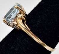 Beautiful 14K Yellow Gold Blue Topaz and Diamond Ring