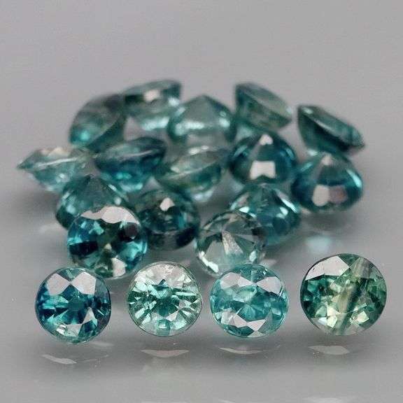 Heated only! 3.09ct blue green Sapphire set