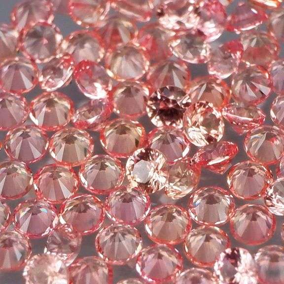 Brilliant 2.55ct diamond cut padparadsha Sapphire set