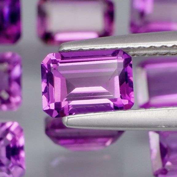 Glittering 8.58ct emerald cut Bolivian Amethyst set