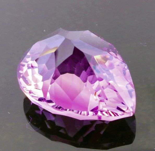 Top tier 14.54ct concave cut Amethyst