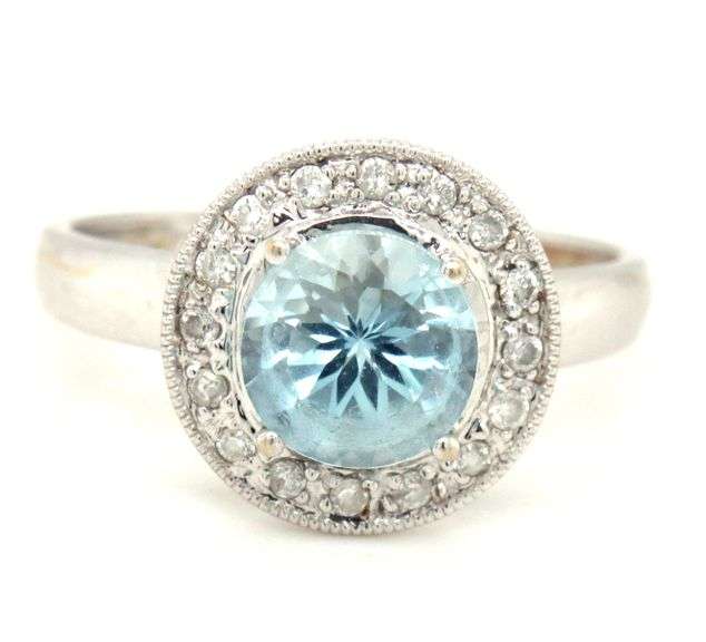 14kt White gold blue topaz and diamond ring