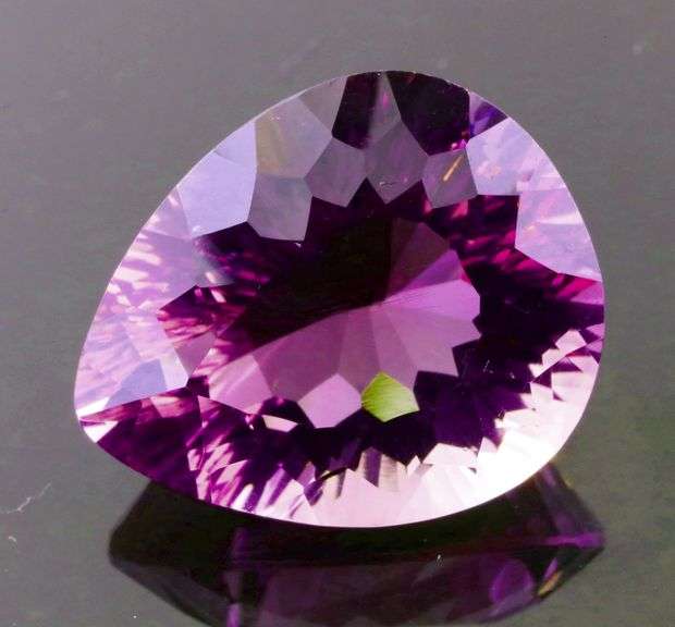 Concave flashing 18.76c bright violet Amethyst