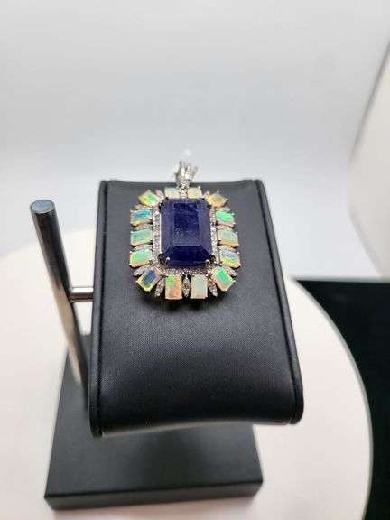 Exquisite 36ct Tanzanite with 1.21ct Natural Diamonds & 14 Rare Opals in silver pendent