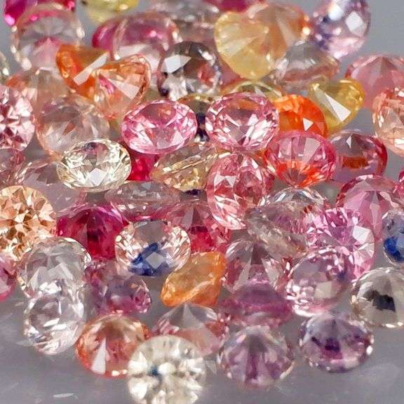 Glittering 65 piece 3.95ct fancy color Sapphire set